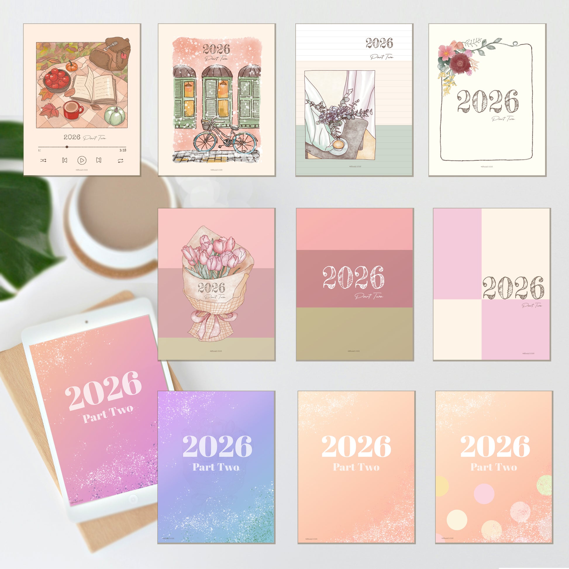 A set of pastel 2026 planner and calendar stationery items arranged on a light surface with a coffee cup and green leaves as props. The set includes a weekly planner cover, a monthly cover, a daily cover, a flower-themed card, color blocks, and two stacked yearly calendar covers labeled '2026 Part Two'.